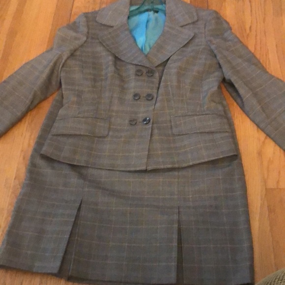 Fully lined jacket and skirt suit.
